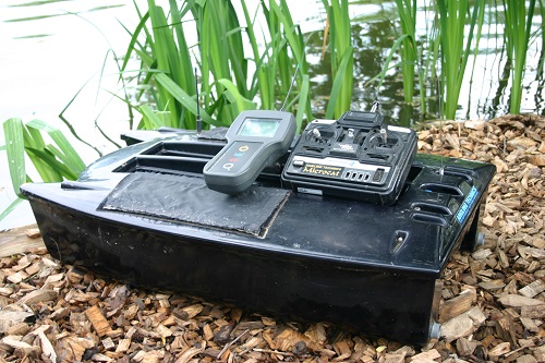 Bait boats with an echo sounder can find the carp but they won't catch them for you.